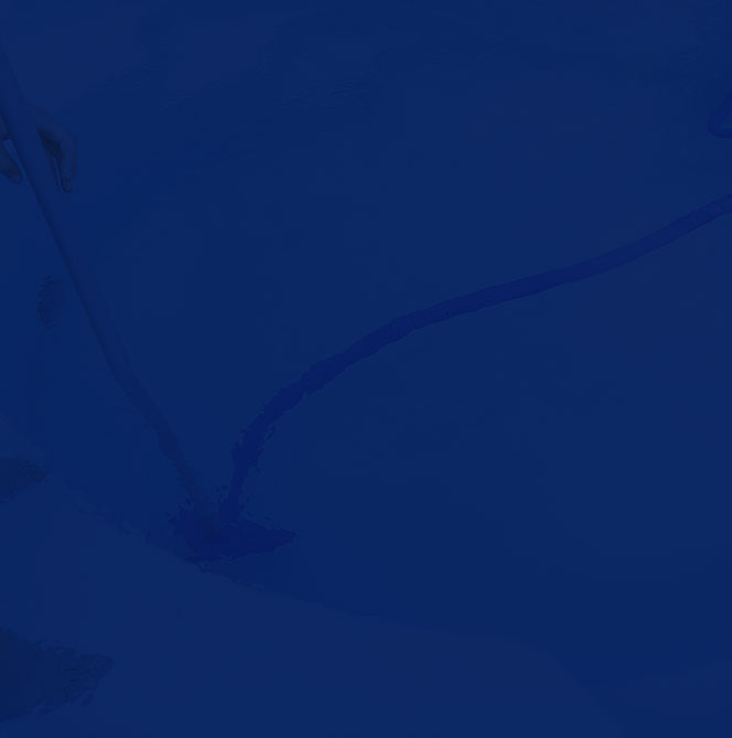 A blue-toned abstract image with subtle lines and shapes.